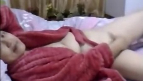 Fat Chinese Granny In A Red Bathrobe OnSkype